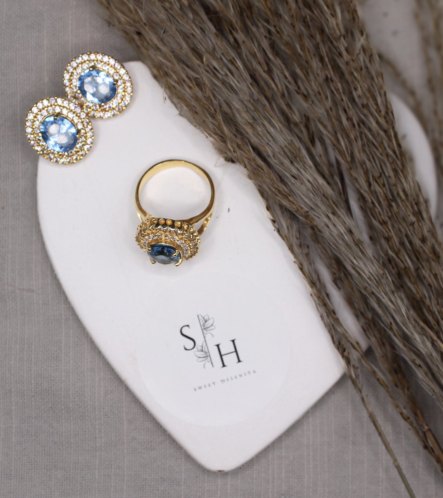 Stunning Gold Jewelry Set with Blue Stone.